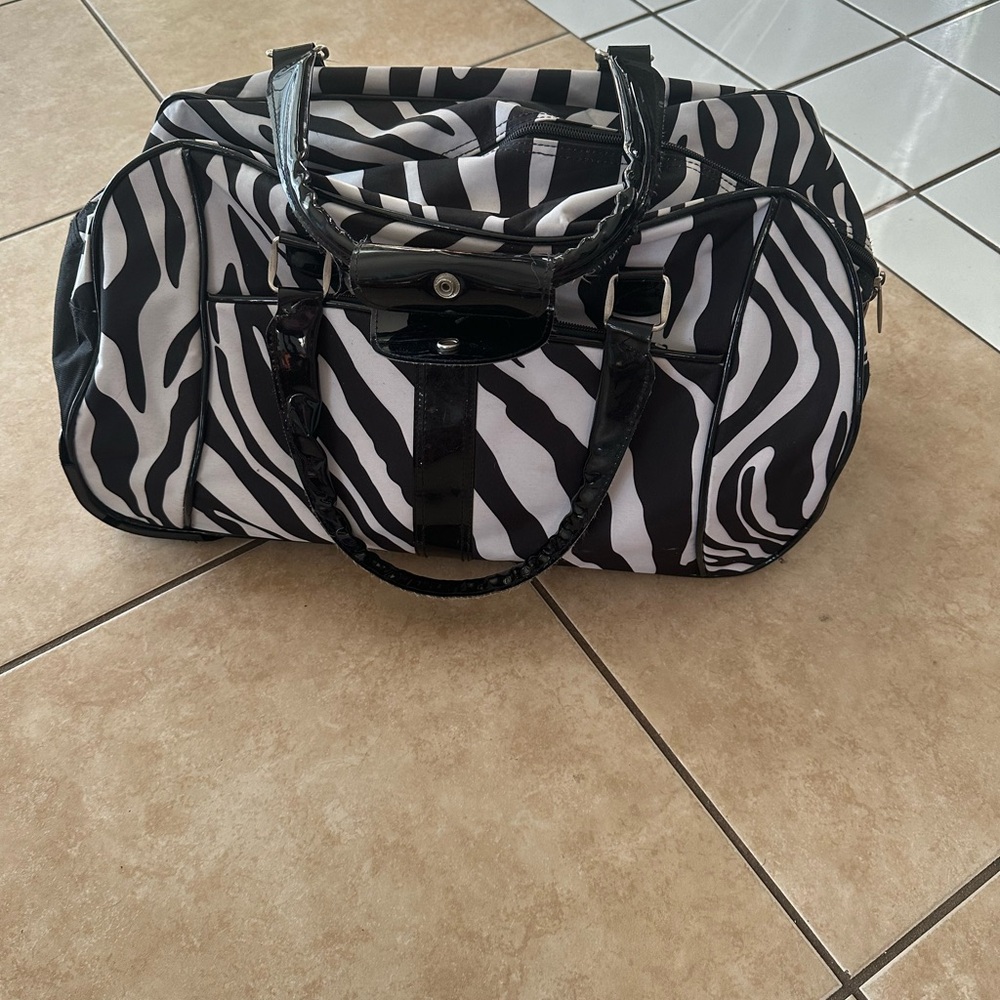 Dejuno Duffle/travlwr with roller